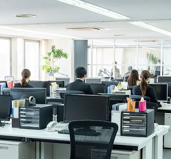 back office view with people working at desk